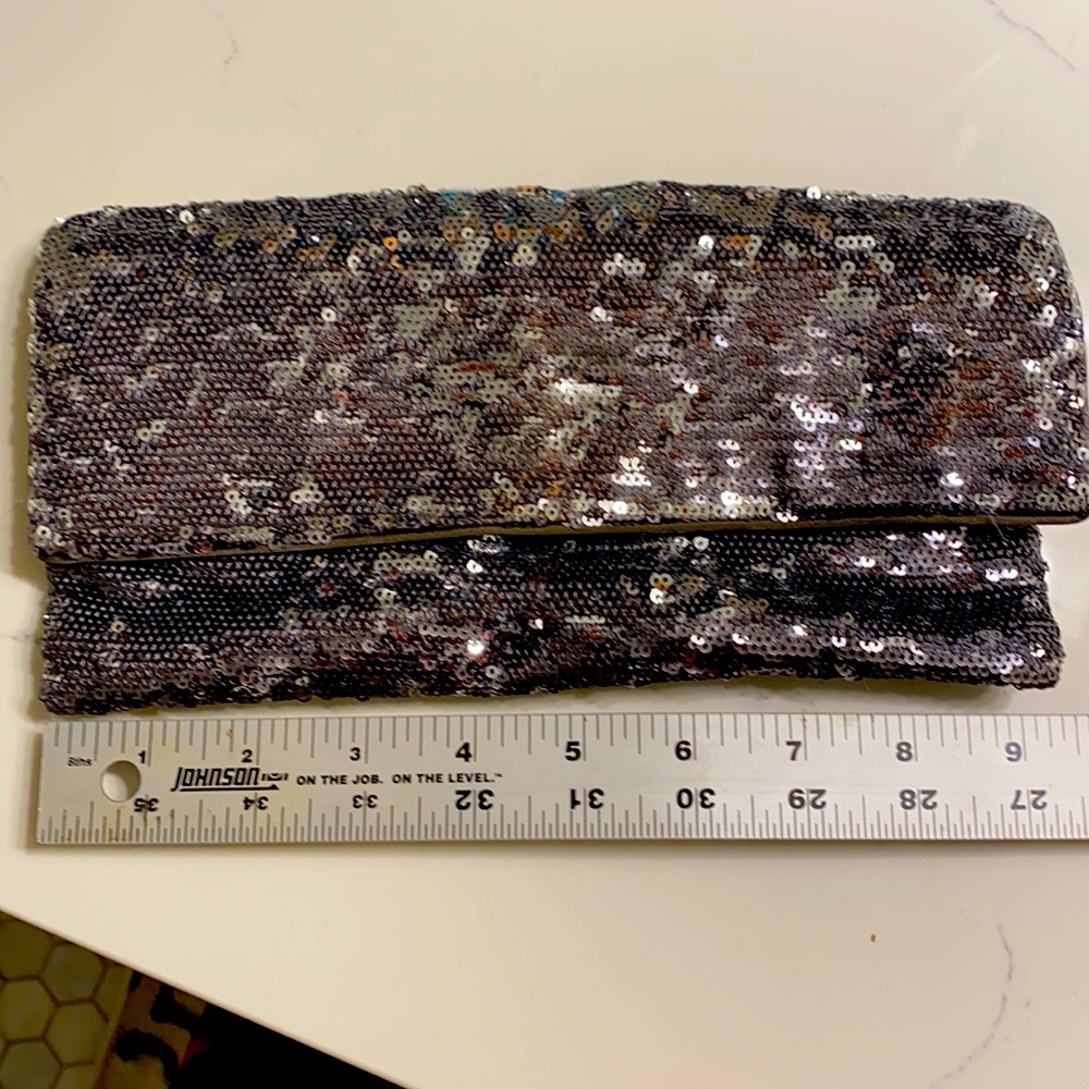 BCBG carbon color sequin clutch, with strap.